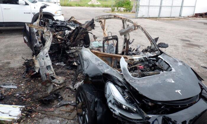 Tesla Driver Killed in Fiery Crash Hit 90 mph, Report Says