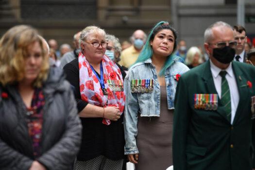 Joanne Beavis from Legacy (served 25 years) alongside Megan Rull during a Remembrance Day 2021 Service at The Cenotoph at Martin Place in Sydney, Australia, on Nov. 11, 2021. Megan Rull lost her partner to suicide last year after serving in Afghanistan. (Mick Tsikas - Pool/Getty Images)
