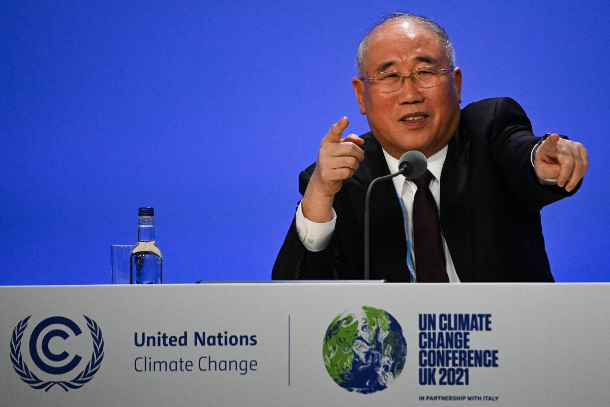 China's special climate envoy, Xie Zhenhua, speaks during a joint China and U.S. statement on a declaration enhancing climate action in the 2020s, on day eleven of the COP26 climate change conference at the SEC in Glasgow, Scotland, on Nov. 10, 2021. (Jeff J Mitchell/Getty Images)