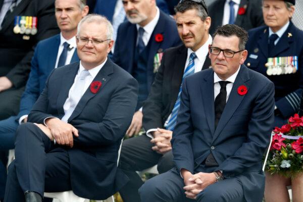 Australian Prime Minister Scott Morrison (L) and Premier of Victoria Daniel Andrews (R) attend the Remembrance Day service at the Shrine of Remembrance on November 11, 2021, in Melbourne, Australia. (Photo by Darrian Traynor/Getty Images)