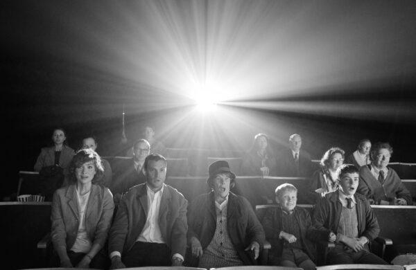 The characters of "Belfast" enjoying a movie. (Rob Youngson/Focus Features)
