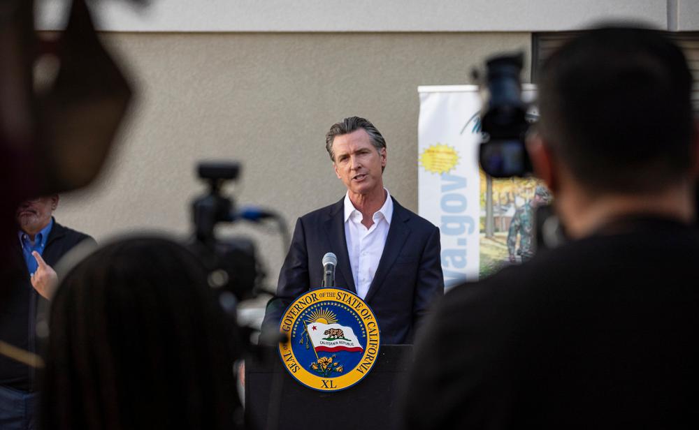 California Gov. Gavin Newsom speaks with reporters at a Veterans Affairs facility in Brentwood, Calif., on Nov. 10, 2021. (John Fredricks/The Epoch Times)