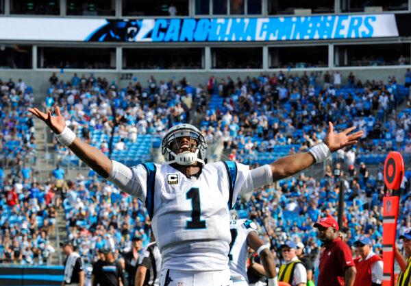 Carolina Panthers' Cam Newton (1) celebrates a touchdown against the San Francisco 49ers in the second half of an NFL football game in Charlotte, N.C., on Sept. 18, 2016. (Mike McCarn/AP Photo)