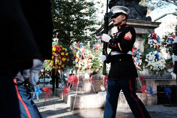 Marines participate in a wreath-laying ceremony during the Veterans Day Parade in New York City, on Nov. 11, 2021. (Spencer Platt/Getty Images)