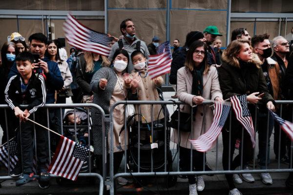 Spectators watch the Veterans Day Parade in New York City, on Nov. 11, 2021. (Spencer Platt/Getty Images)