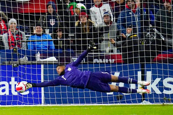 United States' Zack Steffen makes a save against Mexico during the first half of a FIFA World Cup qualifying soccer match, in Cincinnati, on Friday, Nov. 12, 2021. (Julio Cortez/AP Photo)