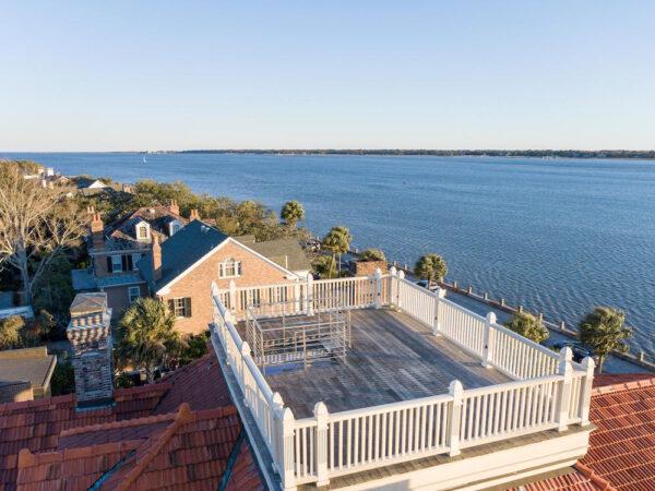 The rooftop observation deck offers the owners a 360-degree panoramic view of one of America’s most beautiful cities, the harbor, and the barrier islands beyond. (Courtesy of Ellis Creek Photography)