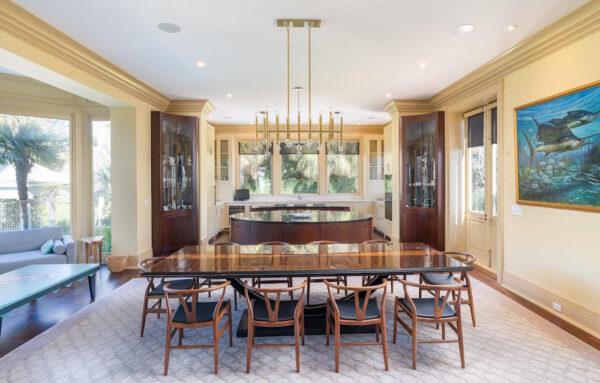 A view of the spacious kitchen from the family room. This space is a nice blend of traditional colonial charm with unpretentious contemporary utility. Adjacent on the left is the breakfast room with doors leading to the pool and gardens. (Courtesy of Ellis Creek Photography)