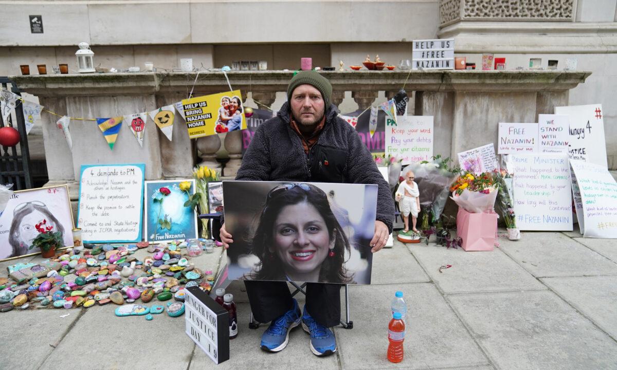 Richard Ratcliffe, the husband of Iranian detainee Nazanin Zaghari-Ratcliffe, on the 19th day of his hunger strike outside The Foreign, Commonwealth, and Development Office in London on Nov. 11, 2021. (Stefan Rousseau/PA)