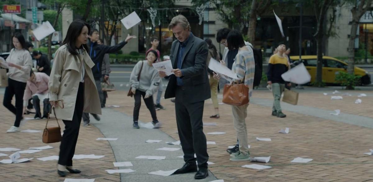 Min (Anastasia Lin) and journalist Daniel Davis (Sam Trammell), who senses something is not quite right in the government propaganda about Falun Gong, in a scene from “Unsilenced.” (Courtesy of Flying Cloud Productions)