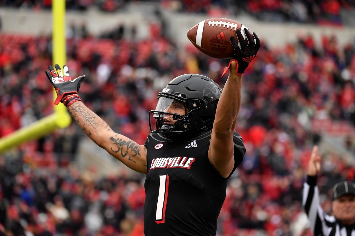 Louisville wide receiver Jordan Watkins (1) acknowledges the fans after scoring a touchdown during the first half of an NCAA college football game against Syracuse in Louisville, Ky., on Nov. 13, 2021. (Timothy D. Easley/AP Photo)
