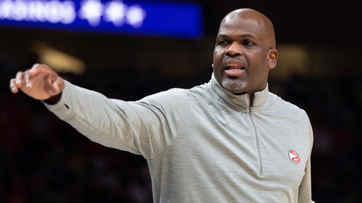 Atlanta Hawks head coach Nate McMillan points to the bench for a substitution during the first half of an NBA basketball game against the Milwaukee Bucks in Atlanta, on Nov. 14, 2021. (Hakim Wright Sr./AP Photo)