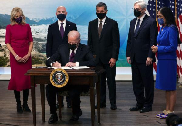 U.S. President Joe Biden signs an executive order for public safety and justice reform for Native American communities at the Eisenhower Executive Office Building in Washington, D.C., on Nov. 15, 2021. (Alex Wong/Getty Images)