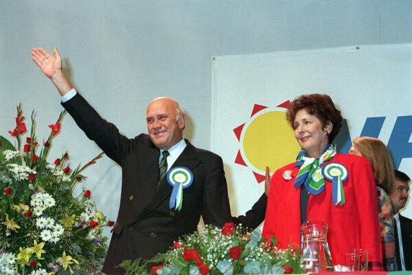 Ruling National Party President Frederick de Klerk and his wife Marike de Klerk greets supporters during a campaign rally in Nasrec exhibition centre, between Johannesburg and Soweto, in South Africa, on April 16, 1994. (Harold Gess/AFP via Getty Images)