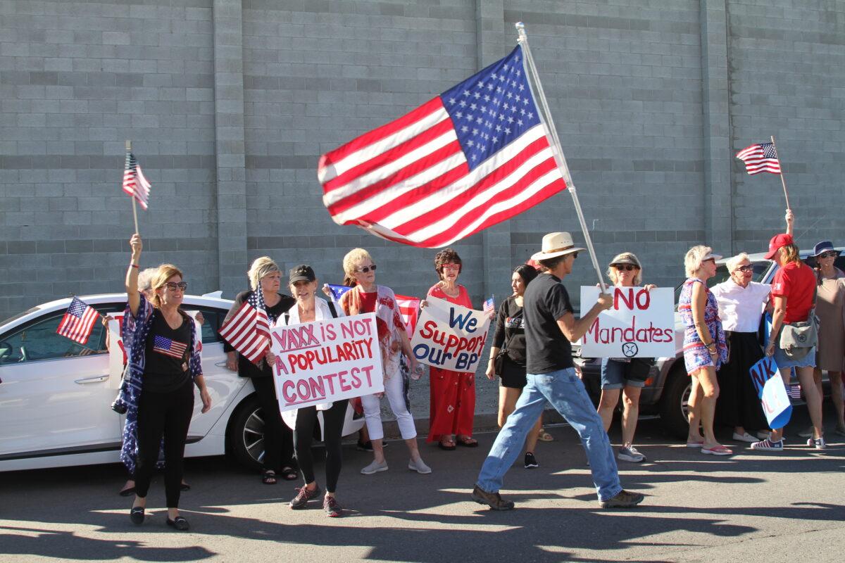 Demonstrators gather at a Border Patrol facility in Indio, Calif., on Nov. 11, 2021. (Brad Jones/The Epoch Times)
