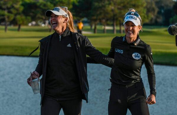 Nelly Korda, right, celebrates with her sister Jessica Korda after she won LPGA Pelican Women's Championship golf tournament at Pelican Golf Club, in Belleair, Fla., on Nov. 14, 2021. (Steve Nesius/AP Photo)