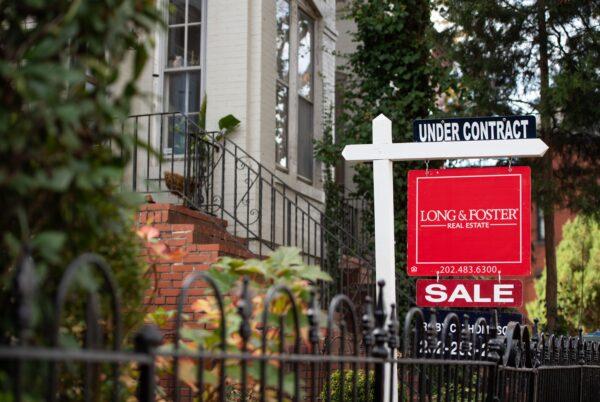 A house's real estate for sale sign shows the home as being "Under Contract" in Washington, D.C., on Nov. 19, 2020. (Saul Loeb/AFP via Getty Images)