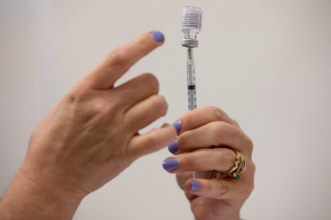 CDC Announces Move to Shorten Waiting Period for Pfizer COVID-19 Boosters