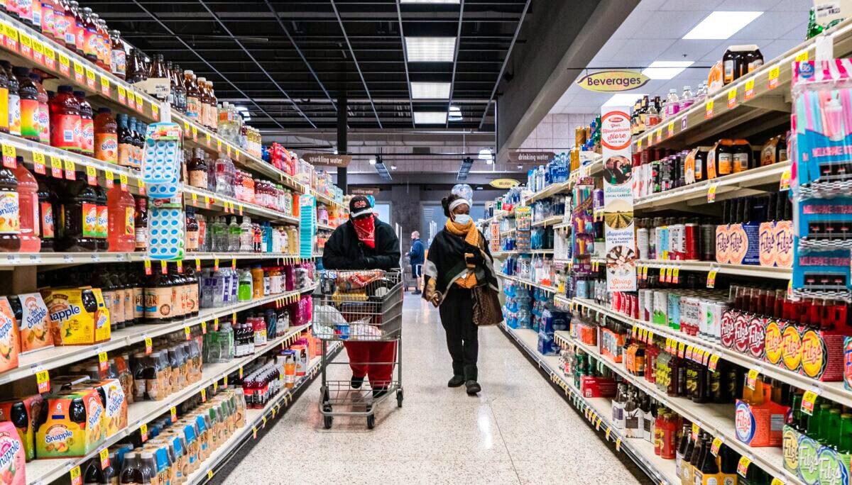 Shoppers browse in a supermarket in St. Louis, on April 4, 2020. (Lawrence Bryant/Reuters)