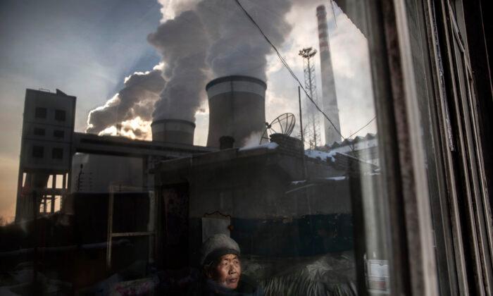 ANALYSIS: Beijing’s Emissions Commitment Being Questioned as Kerry Holds Climate Talks in China