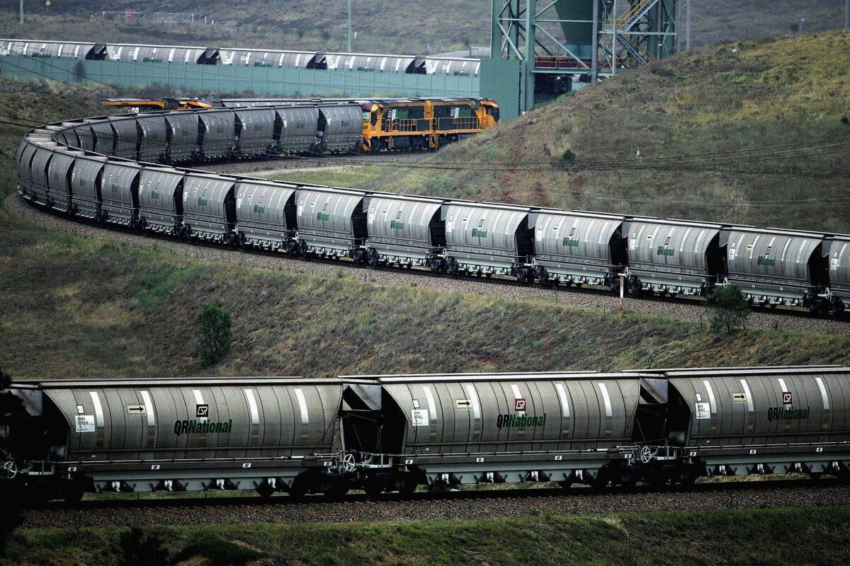 A coal train awaits loading at BHP Billiton's Mt Arthur coal mine in Muswellbrook, Australia. Some experts say that political disputes are the root cause of current coal shortages, such as China's power shortages being tied to its decision to ban coal from Australia. (Ian Waldie/Getty Images)