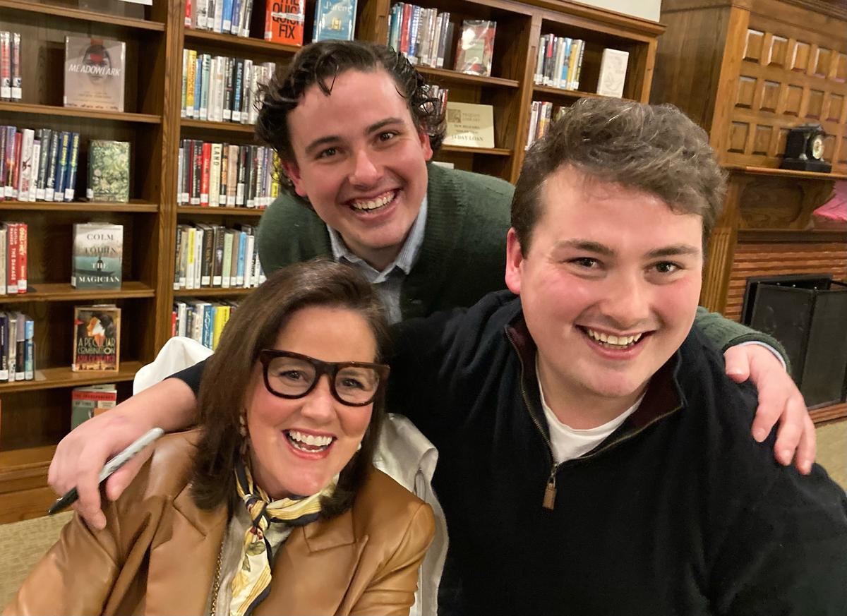 (From L to R) Nadine, PK, and Christopher Isacs are all smiles at a book signing for 'Gobble.' Writing the book kept their spirits and motivation up through a difficult year. (Courtesy of the Isacs family)