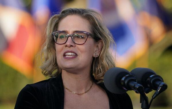 Sen. Kyrsten Sinema (I-Ariz.) speaks during a signing ceremony for H.R. 3684, the Infrastructure Investment and Jobs Act on the South Lawn of the White House on Nov. 15, 2021. (Mandel Ngan/AFP via Getty Images)