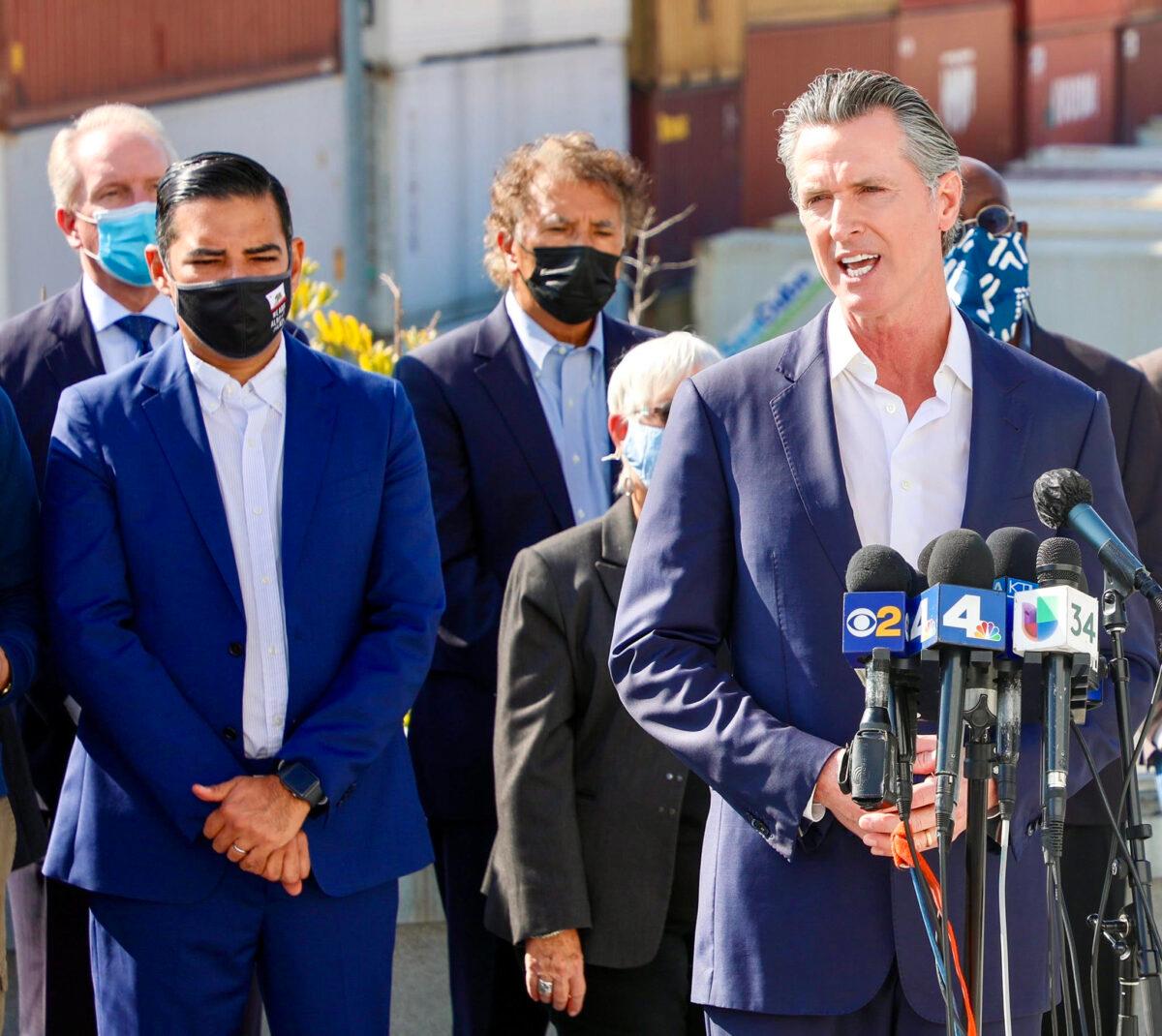Gov. Gavin Newsom announces that trucks may carry slightly heavier loads to ease the supply chain congestion at the ports of Los Angeles and Long Beach on Nov. 17, 2021. (Courtesy of the City of Long Beach)
