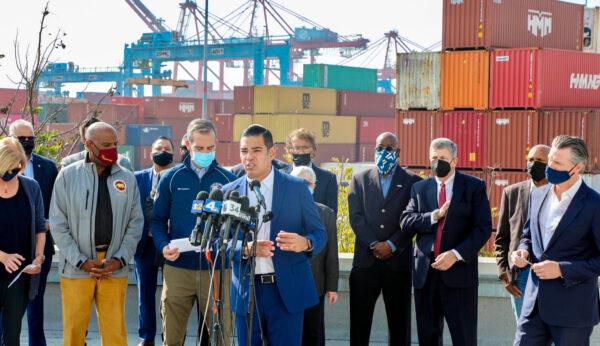 Gov. Gavin Newsom announces trucks may carry slightly heavier loads to ease the supply chain congestion at the Los Angeles and Long Beach, Calif. ports, on Nov. 17, 2021. (Courtesy of the City of Long Beach)