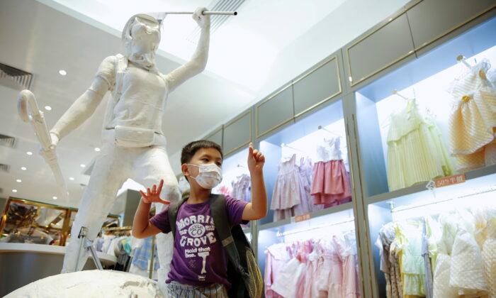 ‘Evil Forces’ Push Hong Kong Pro-Democracy Clothes Shop to Shut