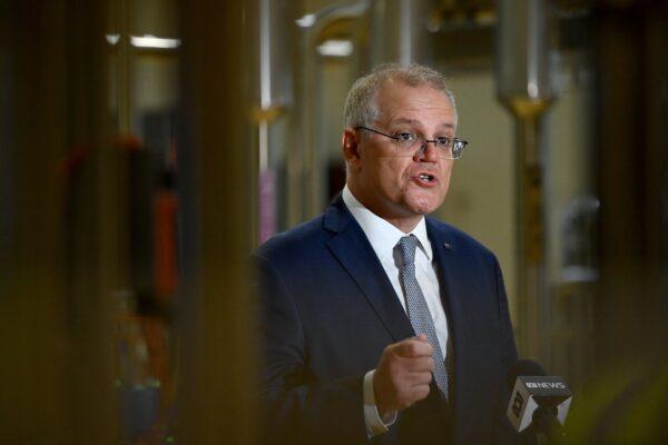 Prime Minister Scott Morrison speaks to the media during a press conference at the Tooheys Brewery in Sydney, Australia, on Nov. 18, 2021. (AAP Image/Bianca De Marchi)