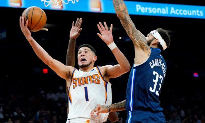 Booker Scores 24 Points, Suns Beat Mavs for 10th Straight