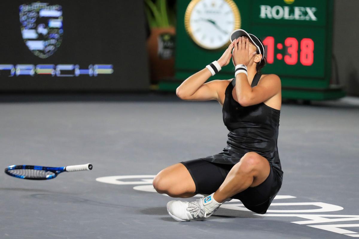 Garbiñe Muguruza, of Spain, reacts after defeating Anett Kontaveit, of Estonia, during the final match of the WTA Finals tennis tournament in Guadalajara, Mexico, on Nov. 17, 2021. (Refugio Ruiz/AP Photo)