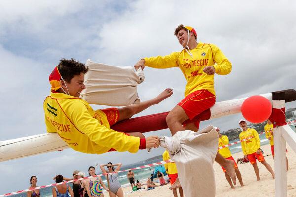 Lifeguards on Bondi Beach take part in the "John Glover" Pillow Fight Challenge in Sydney, Australia, on Jan. 26, 2017. (Brook Mitchell/Getty Images)