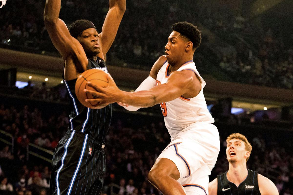 New York Knicks guard RJ Barrett (9) makes pass during the first half of an NBA basketball game against the Orlando Magic in New York, on Nov. 17, 2021. (Jessie Alcheh/AP Photo)