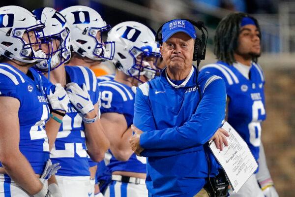 Duke head coach David Cutcliffe walks the sidelines during the second half of an NCAA college football game against Louisville in Durham, N.C., on Nov. 18, 2021. (Gerry Broome/AP Photo)