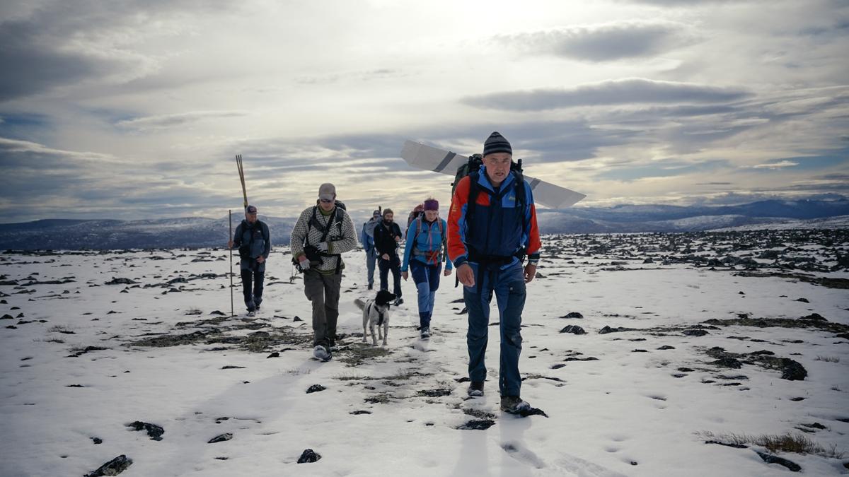 Glacial archaeologists on a three-hour hike to reach the find site where the ski was located. (Courtesy of <a href="https://secretsoftheice.com/">Andreas Christoffer Nilsson, secretsoftheice.com</a>)