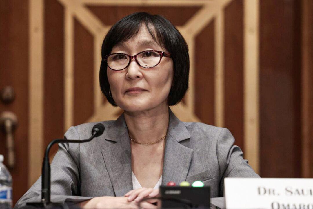 Bank Regulator Nominee Tries to Detach From Her Bank Centralization Ideas During Hearing
