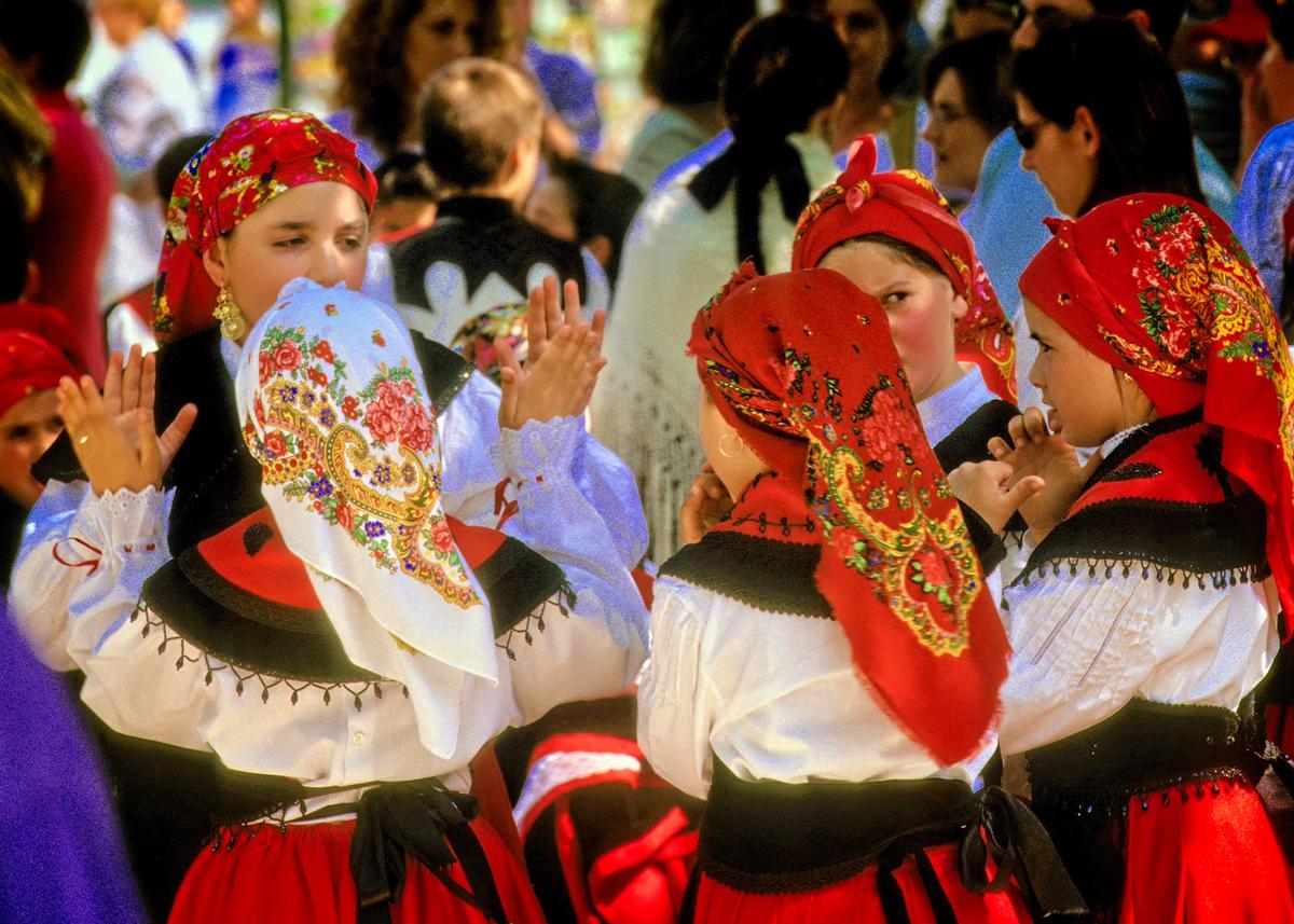 Galicians are known for their festivals, usually marked by the wearing of colorful costumes. (Copyright Fred J. Eckert)