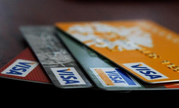 Visa credit cards are arranged on a desk in San Francisco, Calif., on Feb. 25, 2008. (Photo Illustration by Justin Sullivan/Getty Images)