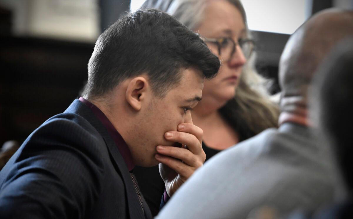 Kyle Rittenhouse puts his hand over his face as he is found not guilty on all counts at the Kenosha County Courthouse in Kenosha, Wis., on Nov. 19, 2021. (Sean Krajacic/Pool/Getty Images)