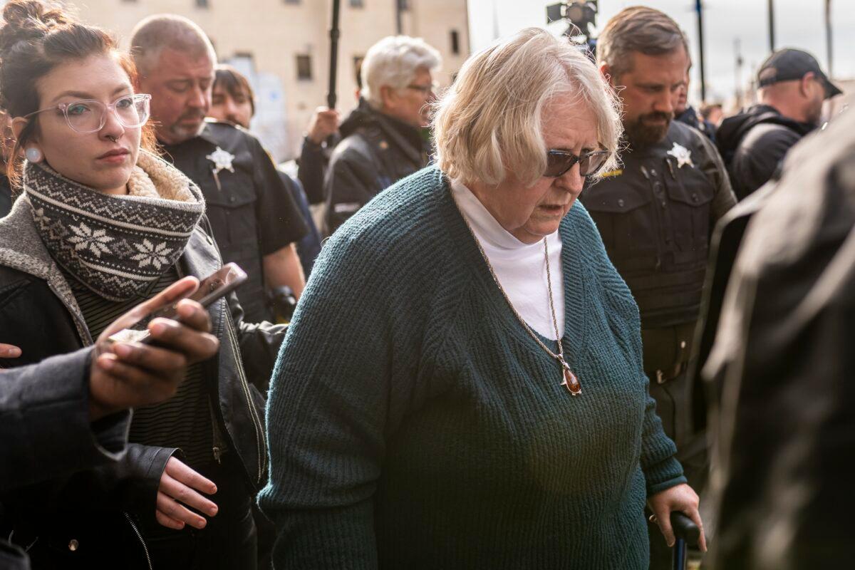 Susan Hughes (C), Anthony Huber's great aunt, and Hubers girlfriend Hannah Gittings, (L), leave the Kenosha County Courthouse after hearing a not guilty verdict in the Rittenhouse trial in Kenosha, Wis., on Nov. 19, 2021. (Nathan Howard/Getty Images)