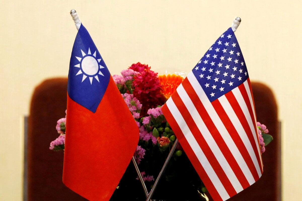 A file photo of the flags of Taiwan and the United States placed for a meeting in Taipei, Taiwan, on March 27, 2018. (Tyrone Siu/Reuters)