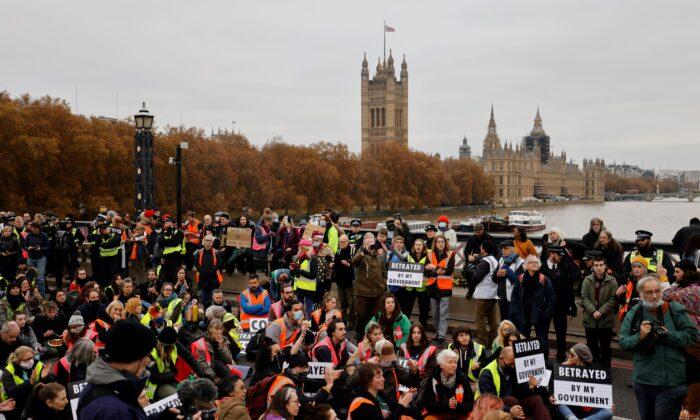 UK Climate Activists Block Bridge in Protest Against Jail Terms