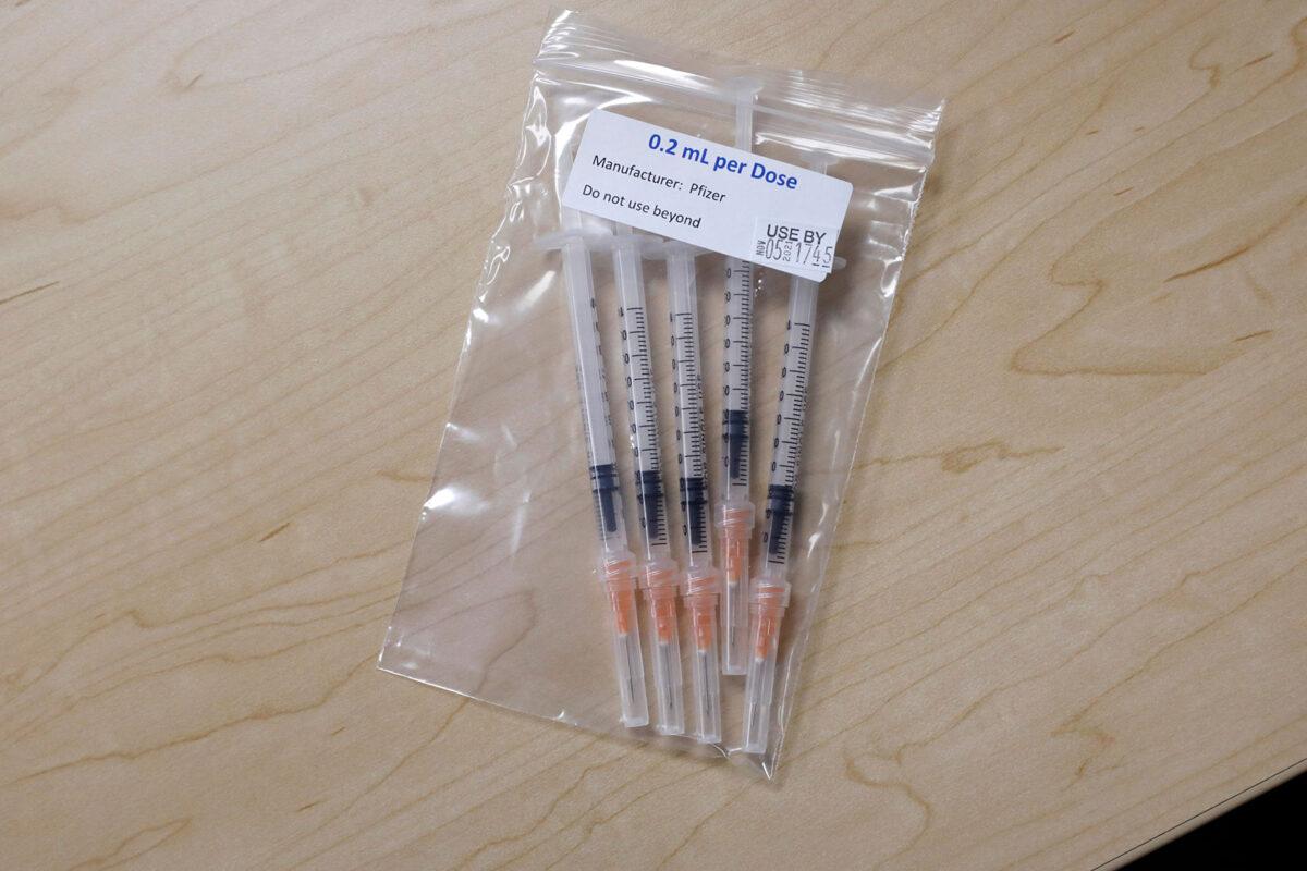 Syringes with the Pfizer COVID-19 vaccine to be administered to children from 5-11 years old are seen at the Beaumont Health offices in Southfield, Mich., on Nov. 5, 2021. (Jeff Kowalsky/AFP via Getty Images)