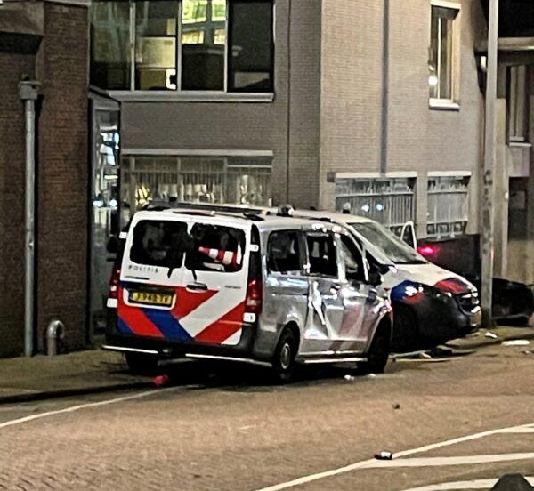 Damaged police vehicles are seen as protests against coronavirus disease (COVID-19) measures turned violent in Rotterdam, Netherlands on Nov. 19, 2021, in this picture obtained from social media. (Obtained by Reuters/via Reuters)
