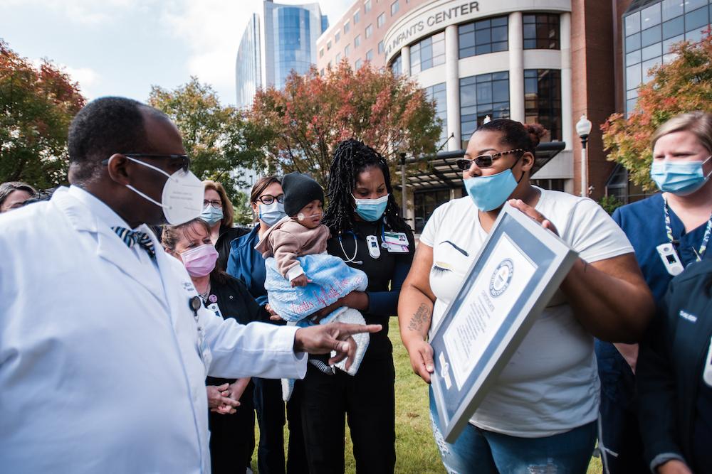 Curtis and Michelle reunite with members from his care team outside of the UAB Women and Infants Center to celebrate his Guinness World Records title. (Courtesy of <a href="https://www.uab.edu/home/">UAB</a>)