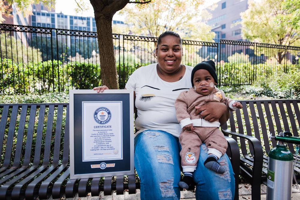 Curtis and Michelle with the Guinness World Records title. (Courtesy of Michelle Butler)