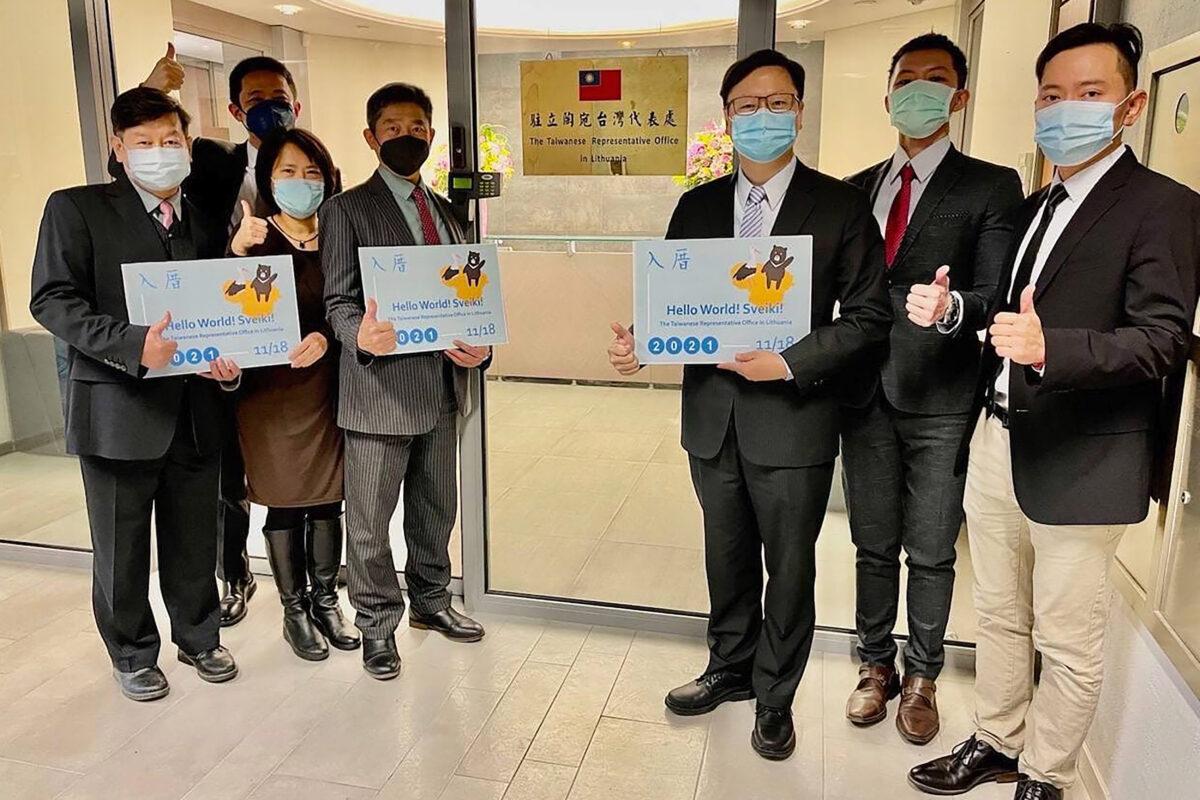 Staff outside the Taiwanese Representative Office in Vilnius, Lithuania, on Nov. 18, 2021. (Taiwan Ministry of Foreign Affairs via AP, File)