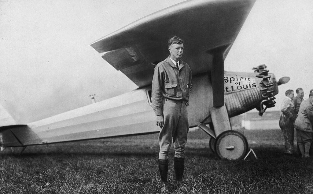 American aviator Charles Lindbergh (1902–1974) poses next to his airplane, the Spirit of St Louis, in May 1927. (Hulton Archive/Getty Images)